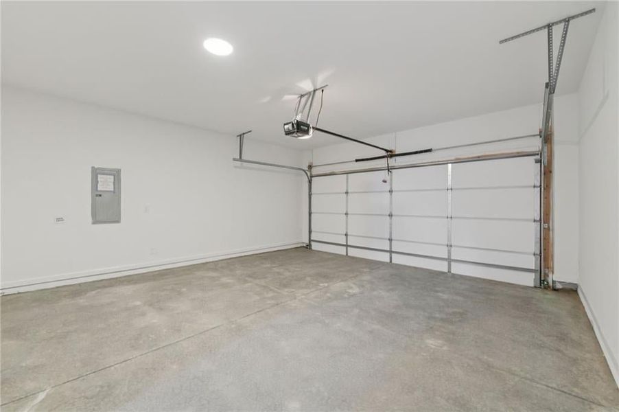 garage with garage door opener - 2 car - Home is under construction and estimated to be completed in June/July 2026 
Pictures represent a previously built home not the actual home