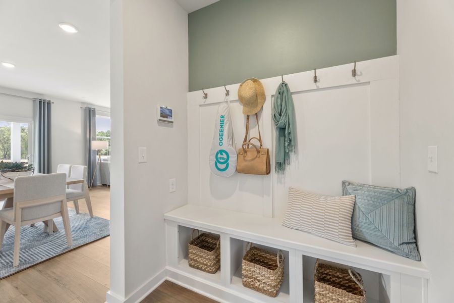 A room with a bed and a chair. A room with a bed and a chair.