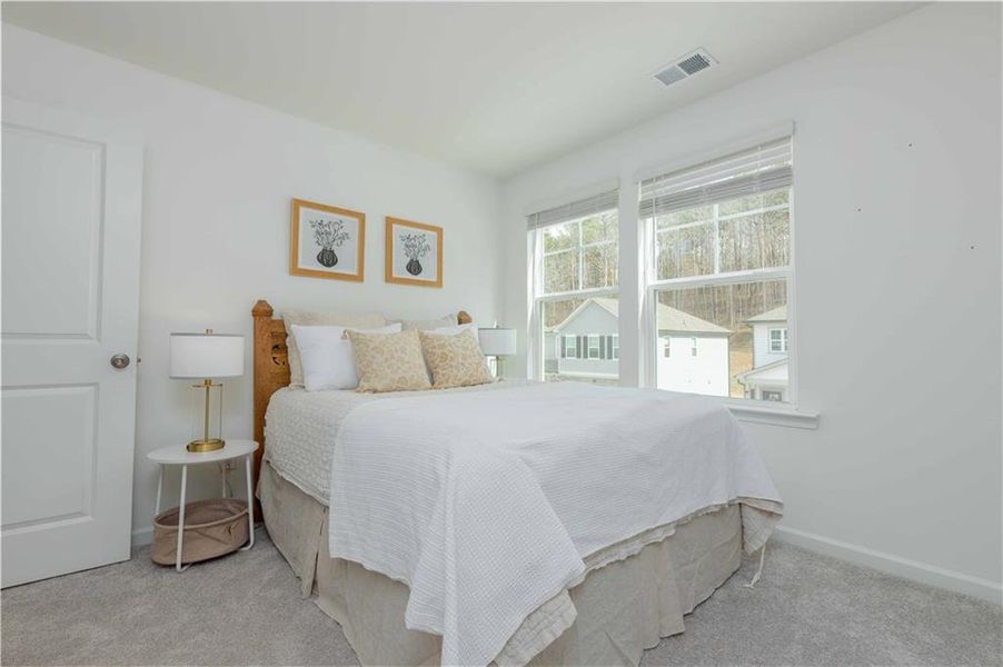 Furnished interior view inside a new home in Creekside at Farmers Crossing, Ball Ground (Image 43).