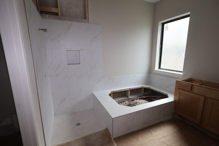In-progress construction of a new home in Riceland - Enclave Collection, Mont Belvieu, TX (Image 20).