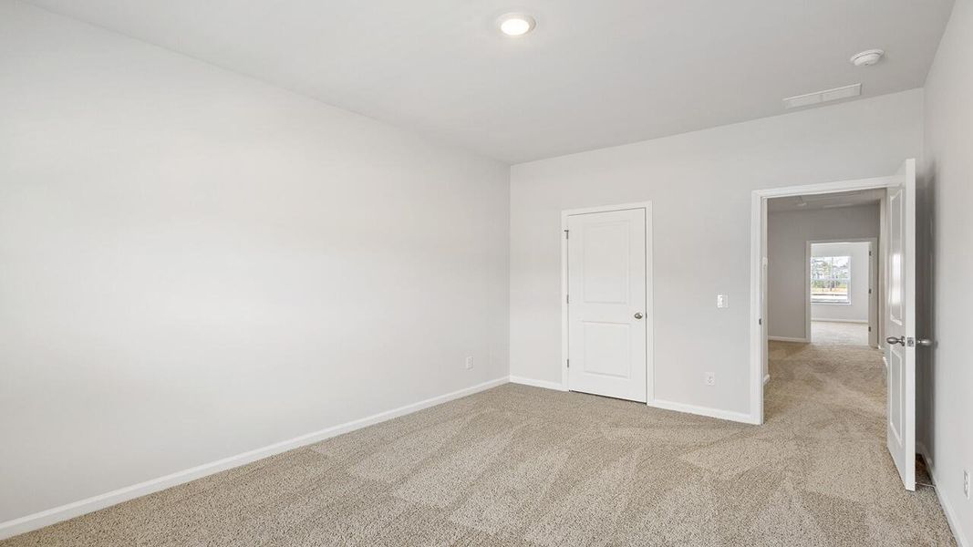 Spacious, unfurnished interior of a new home in The Crossing at St. James, Summerville (Image 20).
