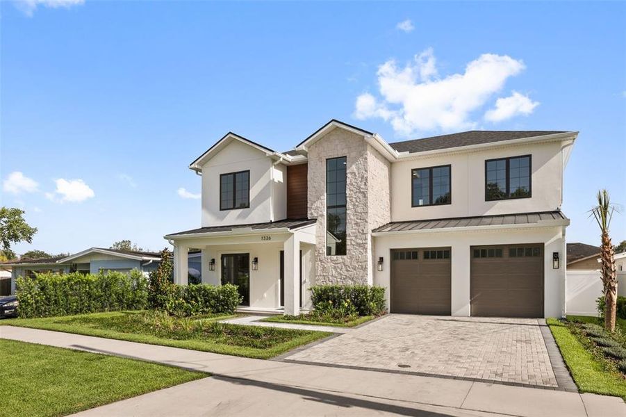 Front exterior of a new home in College Park, Orlando, FL, highlighting curb appeal (Image 26). Front exterior of a new home in College Park, Orlando, FL, highlighting curb appeal (Image 26).