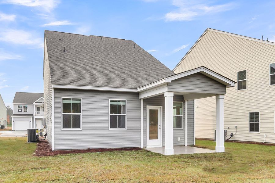 Exterior details and patio area of a home in Wildcat Chase, Summerville (Image 3).