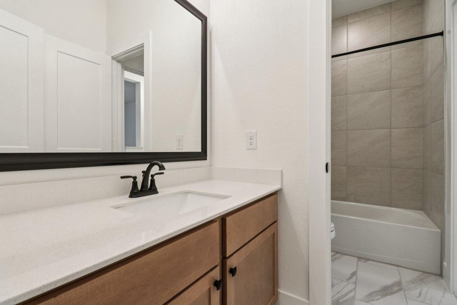 Furnished interior view inside a new home in The Highlands, Porter (Image 6).