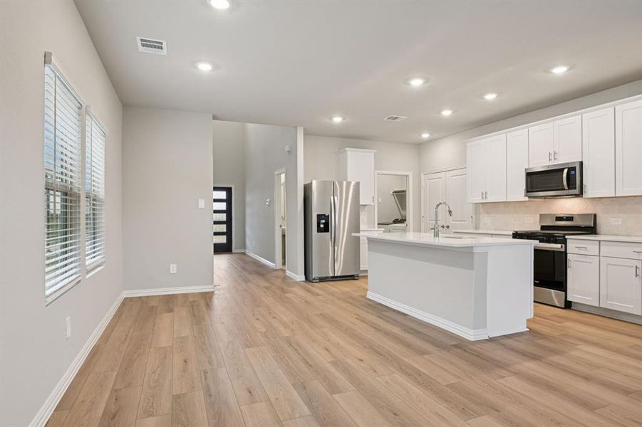 Furnished interior view inside a new home in Lakehaven - Spring Series, Farmersville (Image 9).