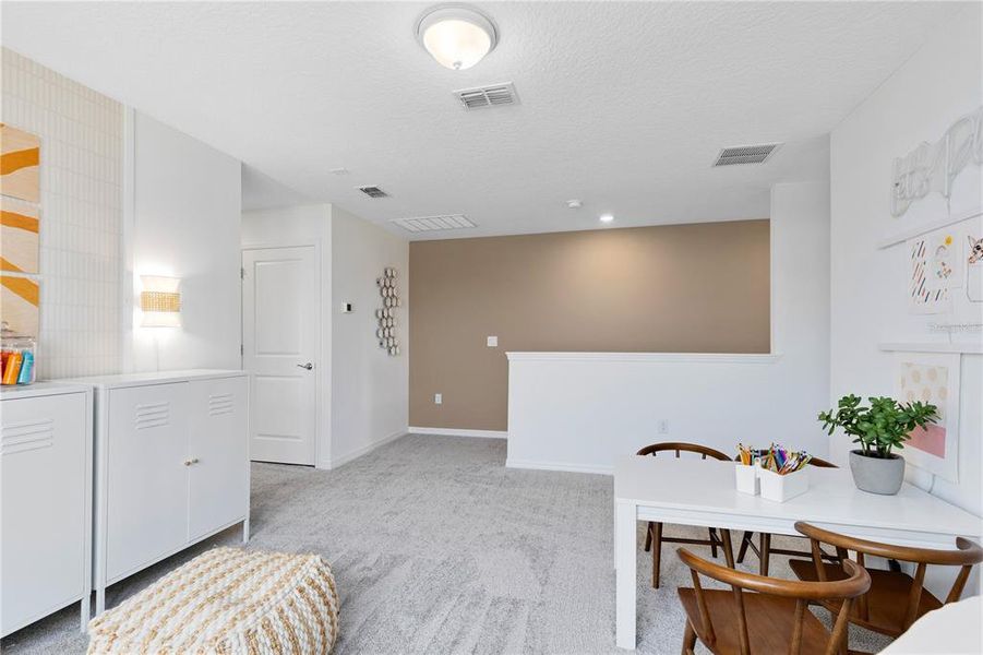 Furnished interior view inside a new home in EverBe, Orlando (Image 14).