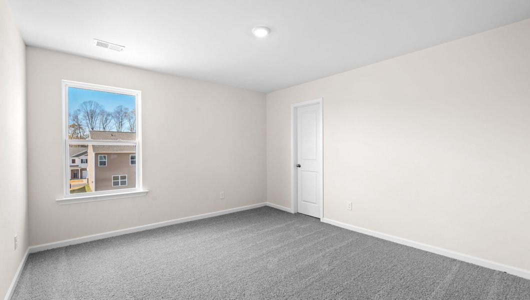 Representative unfurnished interior of a home built from the Biltmore by D.R. Horton in Hunters Ridge, Woodruff (Image 27).