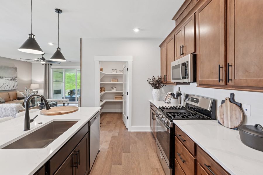 Representative furnished interior of a home built from the Hickory Hill by Tri Pointe Homes in Altis At Serenity, Fuquay Varina (Image 9).