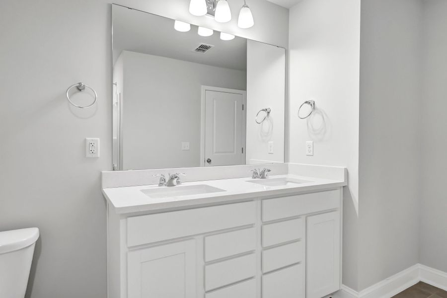 Furnished interior view inside a new home in Monroe Preserve, Chapin (Image 11).