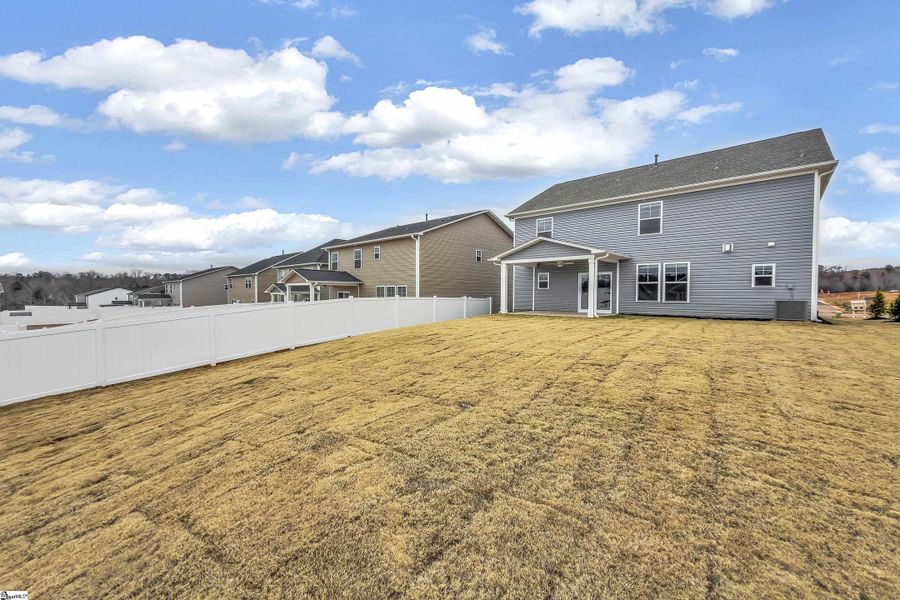 Exterior details and patio area of a home in Sedona, Greenville (Image 4).