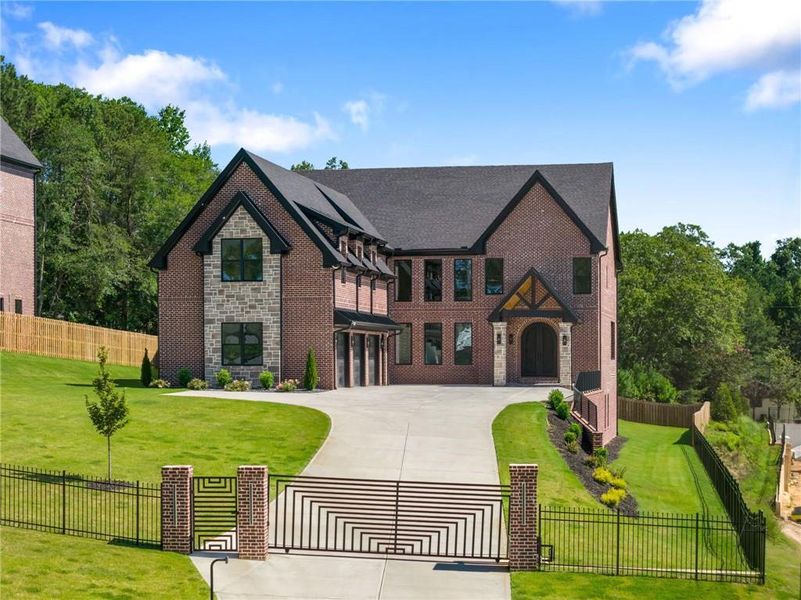 Front exterior of a new home in , Buford, GA, highlighting curb appeal (Image 26). Front exterior of a new home in , Buford, GA, highlighting curb appeal (Image 26).