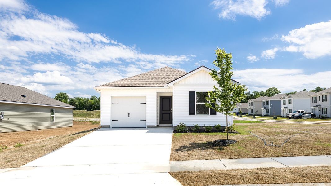 Front exterior of a new home in Saddle Trace, Lewisburg, TN, highlighting curb appeal (Image 22).