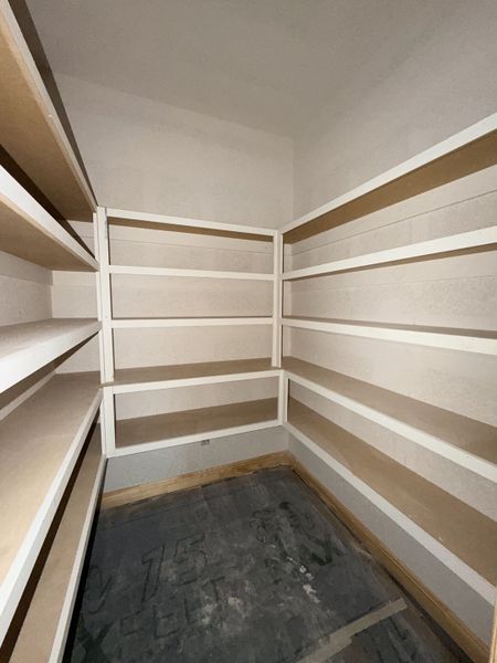 In-progress construction of a new home in Saddle Crest Estates, Weatherford, TX (Image 28).