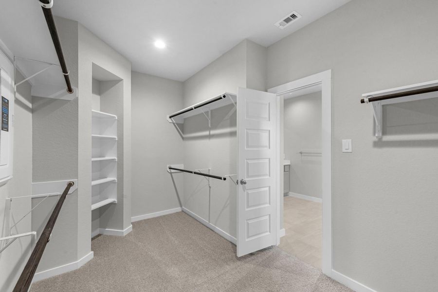 Furnished interior view inside a new home in Sunterra Lakes, Brookshire (Image 8).