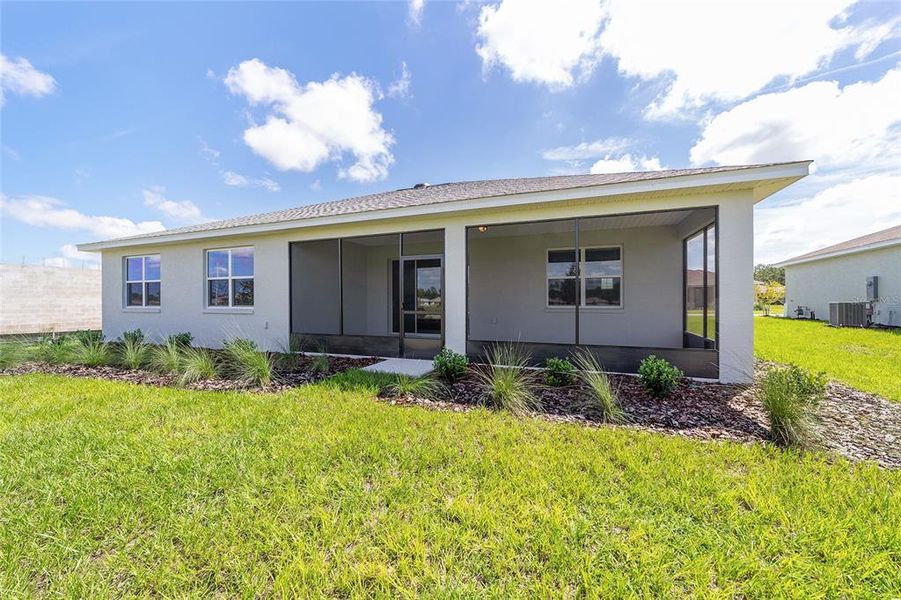 Exterior details and patio area of a home in On Top of the World Communities, Ocala (Image 4).