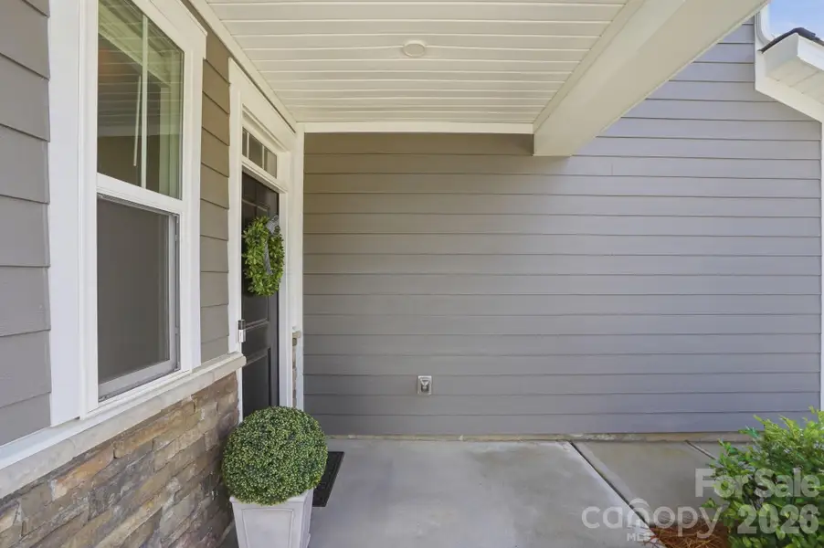 Exterior details and patio area of a home in , Charlotte (Image 25).