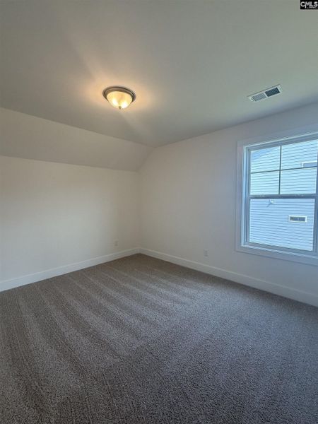 Spacious, unfurnished interior of a new home in Cottages at Roofs Pond, West Columbia (Image 32).