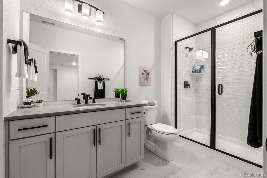 Furnished interior view inside a new home in Wolf Ranch - Enclave Collection, Colorado Springs (Image 32).