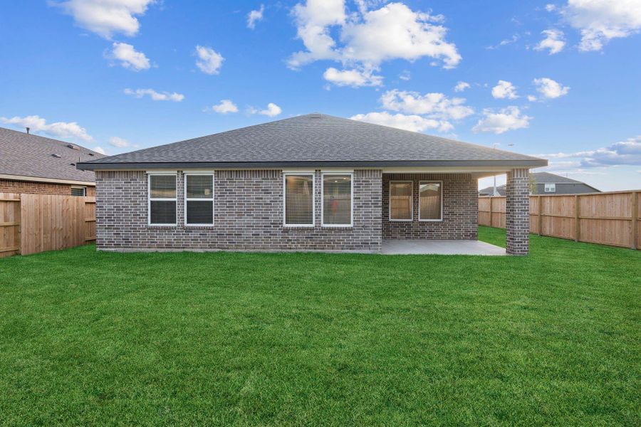 Exterior details and patio area of a home in Westland Ranch 50' Homesites, League City (Image 3).