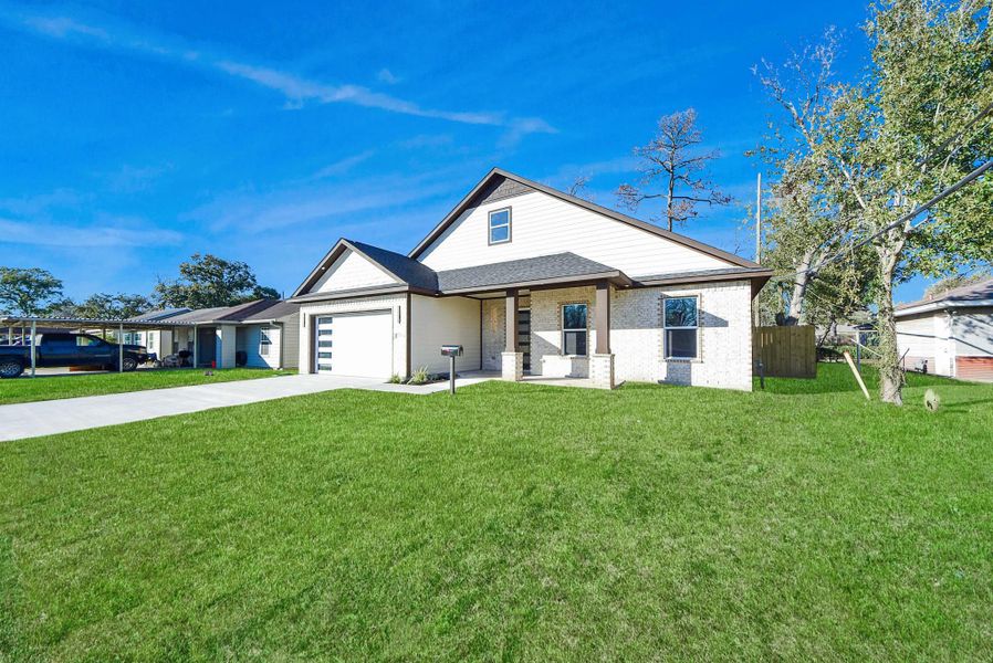 Front exterior of a new home in , Pasadena, TX, highlighting curb appeal (Image 27).