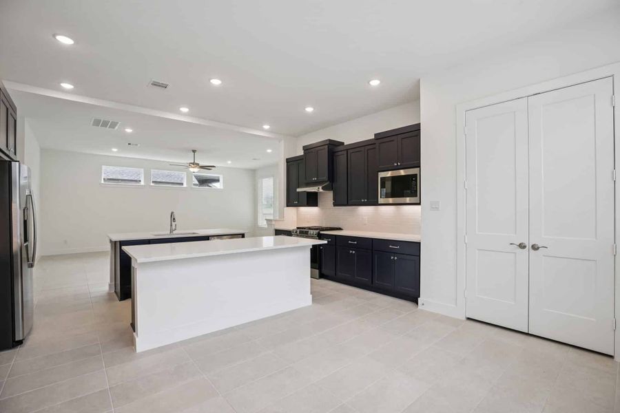 Furnished interior view inside a new home in The Trails, New Caney (Image 14).