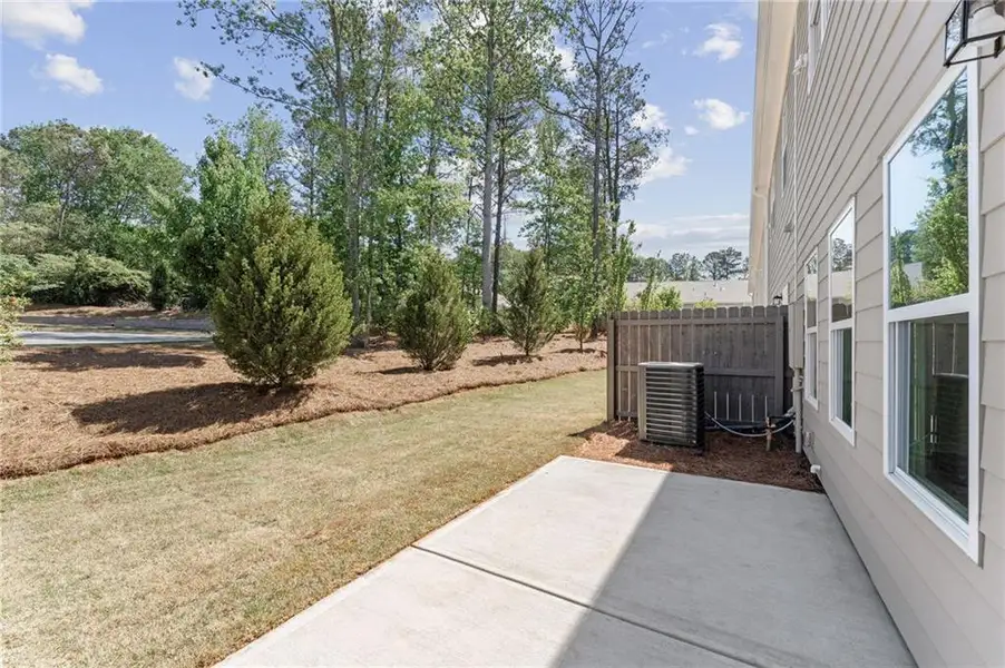 Exterior details and patio area of a home in Cherokee Township, Acworth (Image 4).