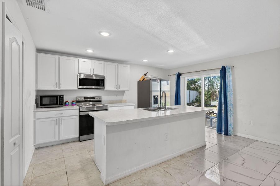 Furnished interior view inside a new home in , Fort Pierce (Image 26).