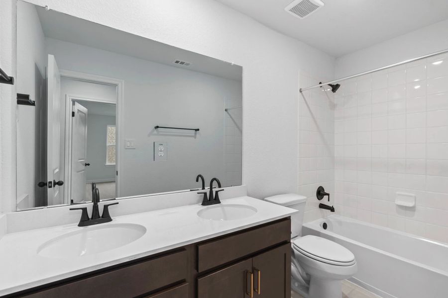 Secondary bathroom. Sample product photo. Actual exterior and interior selections may vary by homesite. Photo may be virtually staged. Secondary bathroom. Sample product photo. Actual exterior and interior selections may vary by homesite. Photo may be virtually staged.