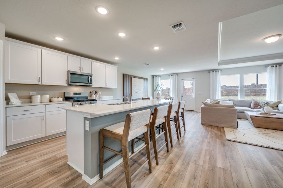 Representative furnished interior of a home built from the Stockdale by Centex in Mobberly Farms, Pilot Point (Image 11).