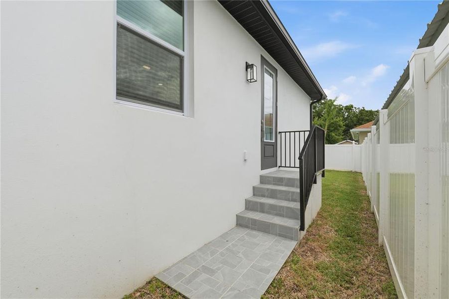 Exterior details and patio area of a home in , Tampa (Image 30).