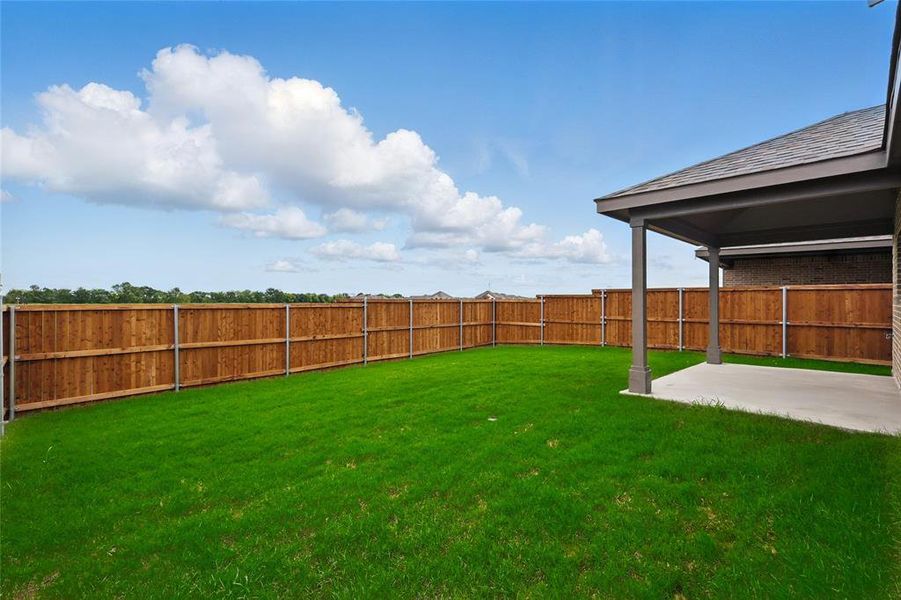 Exterior details and patio area of a home in Bel Air Village, Sherman (Image 3).