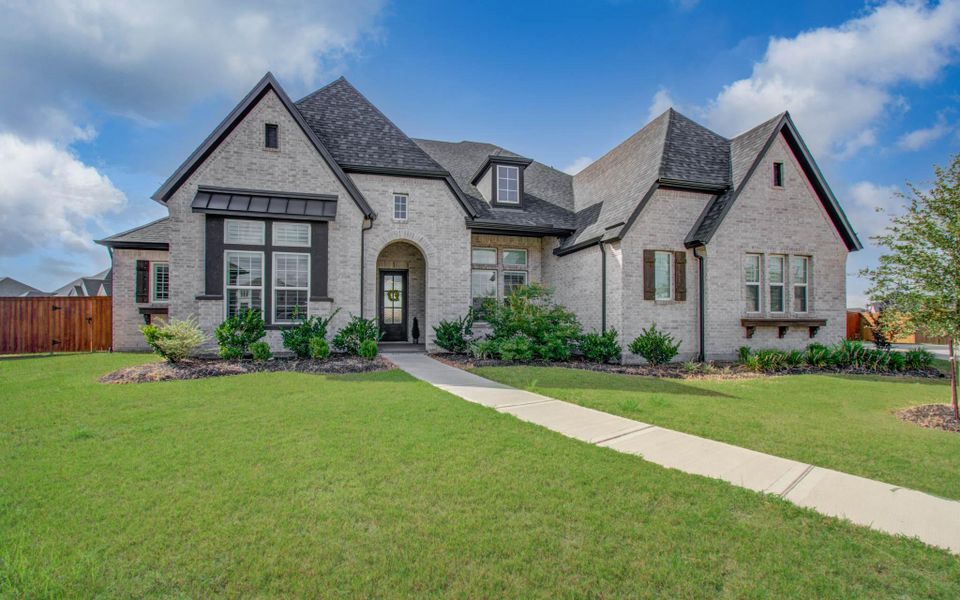 Front exterior of a new home in , Manvel, TX, highlighting curb appeal (Image 22).