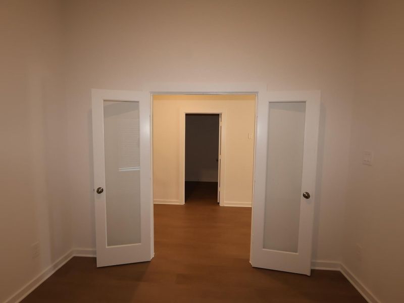 Spacious, unfurnished interior of a new home in Pinewood at Grand Texas, New Caney (Image 21).