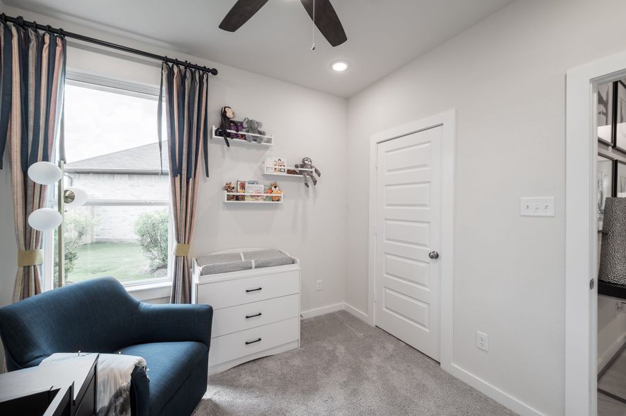 Representative furnished interior of a home built from the Caddo by Tri Pointe Homes in Mason Woods, Cypress (Image 27).