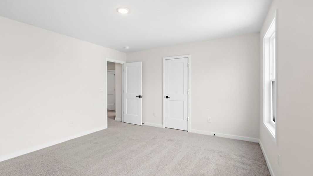 Spacious, unfurnished interior of a new home in Sycamore Cove, Woodruff (Image 31).