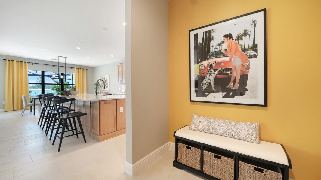 Representative furnished interior of a home built from the Artistry by Neal Communities in SkySail, Naples (Image 27).