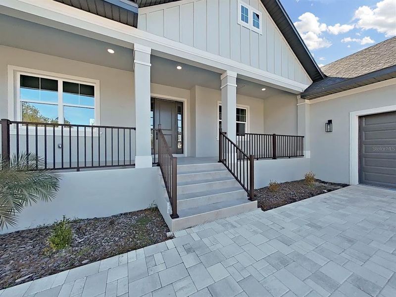 Exterior details and patio area of a home in , Brooksville (Image 3).