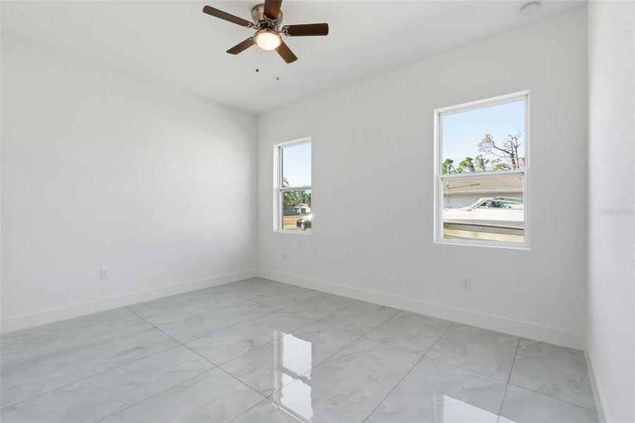 Spacious, unfurnished interior of a new home in , Port Charlotte (Image 21).