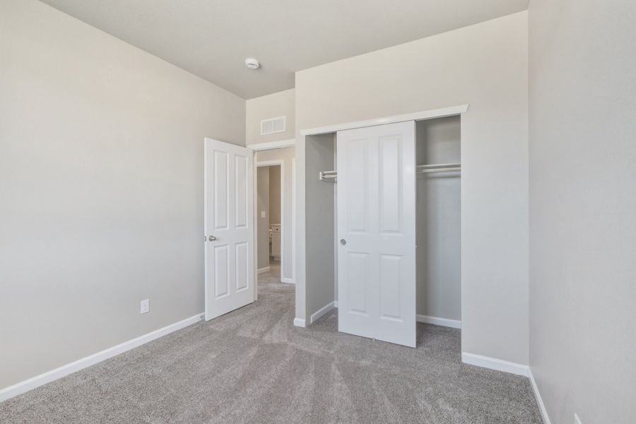 Spacious, unfurnished interior of a new home in Highlands Preserve, Mead (Image 19).