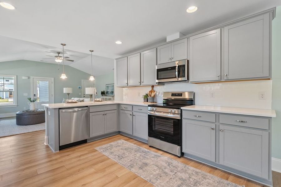 Representative furnished interior of a home built from the Salt Marsh by Bill Clark Homes in Osprey Landing, Southport (Image 11).