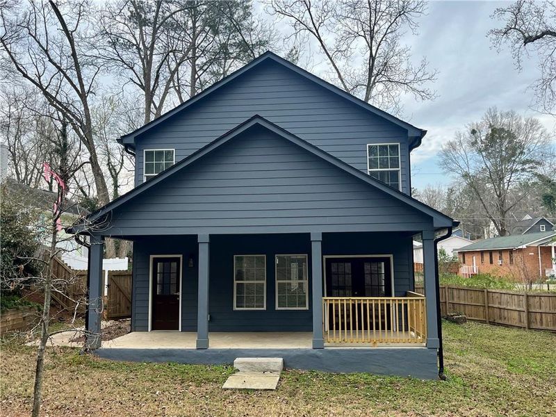 Front exterior of a new home in , Atlanta, GA, highlighting curb appeal (Image 1).