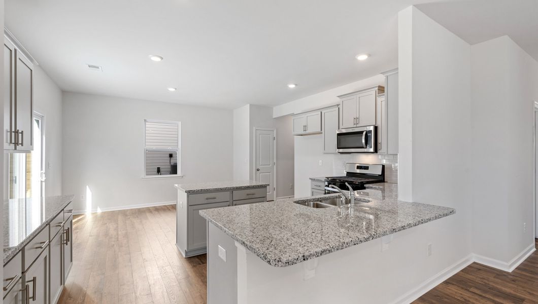 Representative furnished interior of a home built from the Wilmington by D.R. Horton in Forest Brook, Easley (Image 7).
