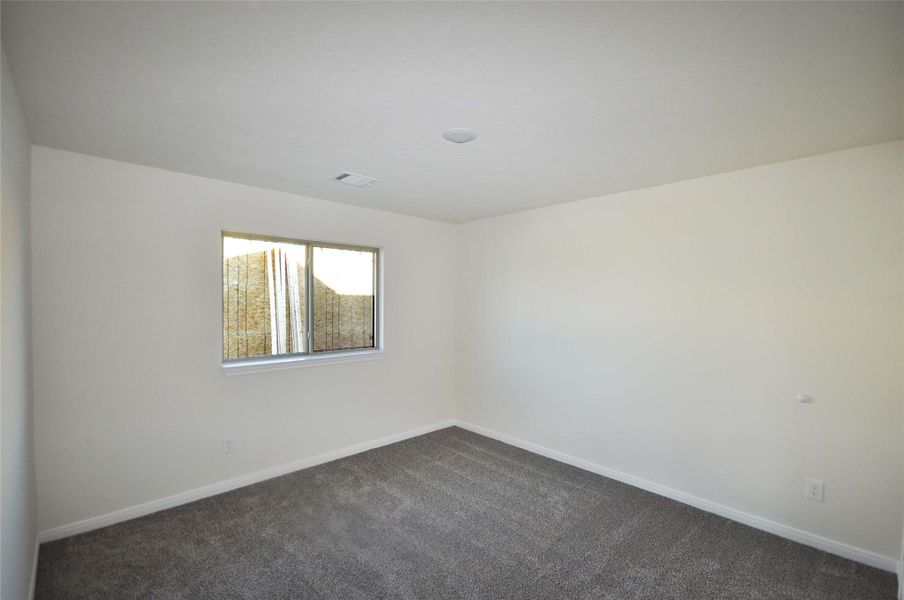 Spacious, unfurnished interior of a new home in Pedregal, League City (Image 21).