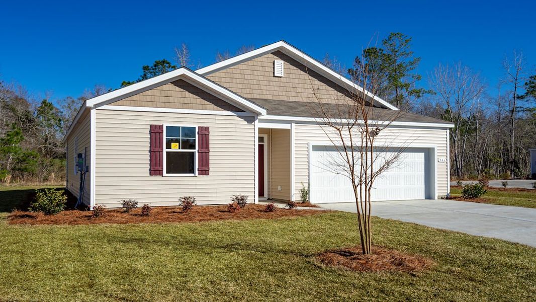 Front exterior of a home in the The Reserve at Wild Horse community, located in Conway, SC (Image 9).