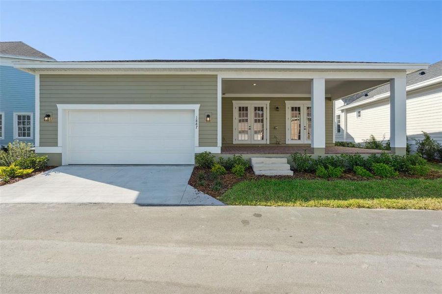 Exterior details and patio area of a home in Celebration - Island Village, Celebration (Image 3).