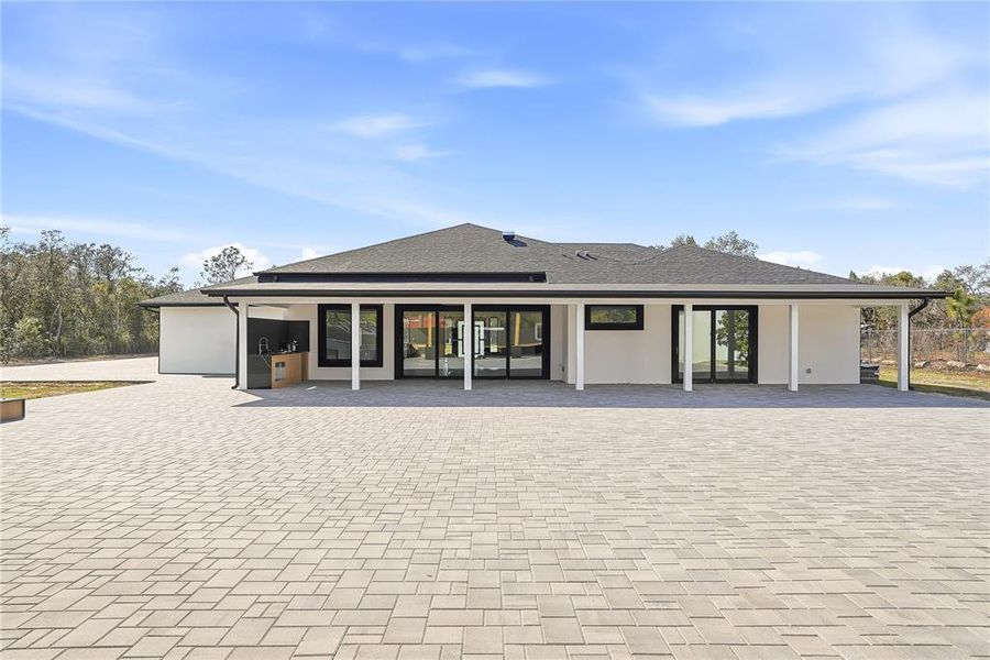 Exterior details and patio area of a home in , Spring Hill (Image 34).