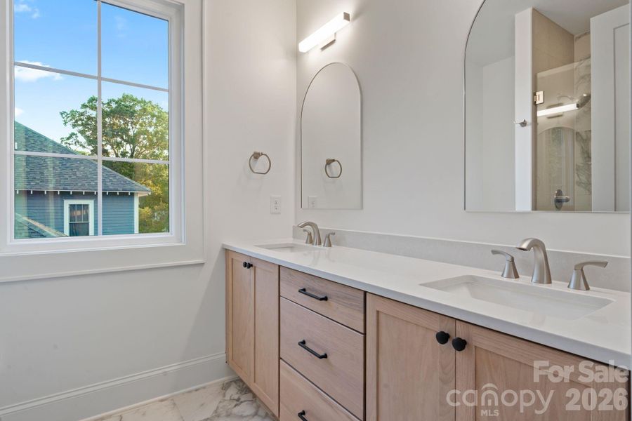 Full bathrooms off upper level ensuite