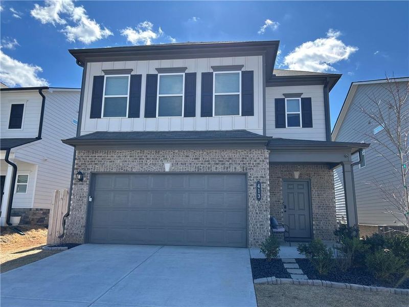 Front exterior of a new home in , Cartersville, GA, highlighting curb appeal (Image 1). Front exterior of a new home in , Cartersville, GA, highlighting curb appeal (Image 1).