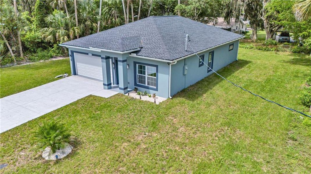Front exterior of a new home in , Daytona Beach, FL, highlighting curb appeal (Image 18).
