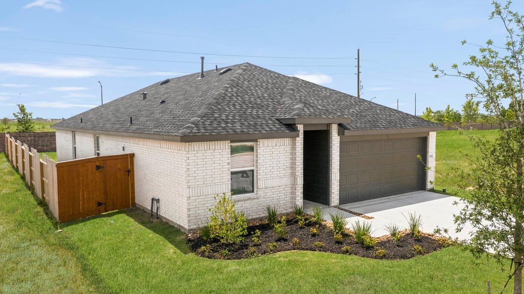 Exterior details and patio area of a home in Sunterra Lakes, Brookshire (Image 18). Exterior details and patio area of a home in Sunterra Lakes, Brookshire (Image 18).